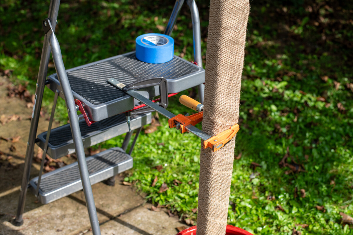 Clamps used to hold stake in place while concrete sets.