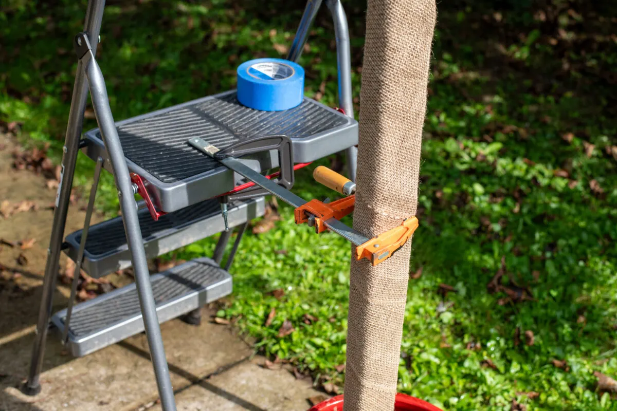 Clamps used to hold stake in place while concrete sets.
