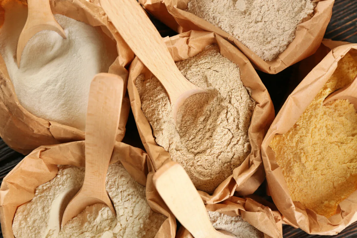 Different types of flour in paper bags